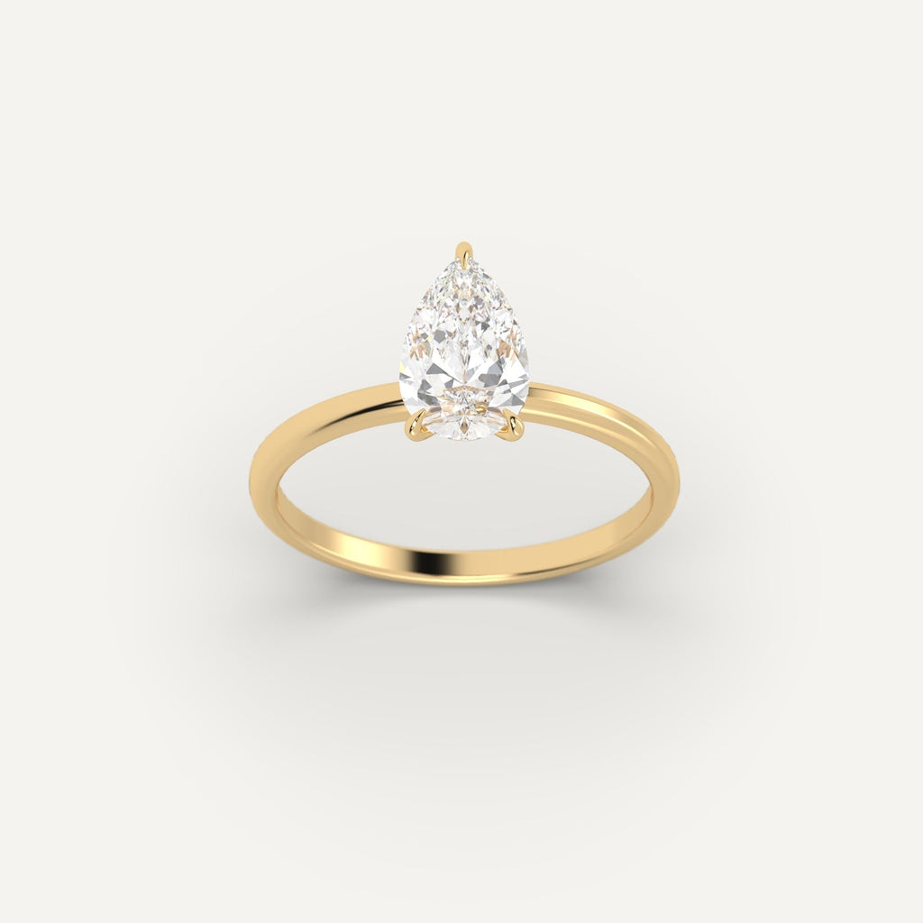 Yellow Gold 2 Carat Engagement Ring On Woman's Hand