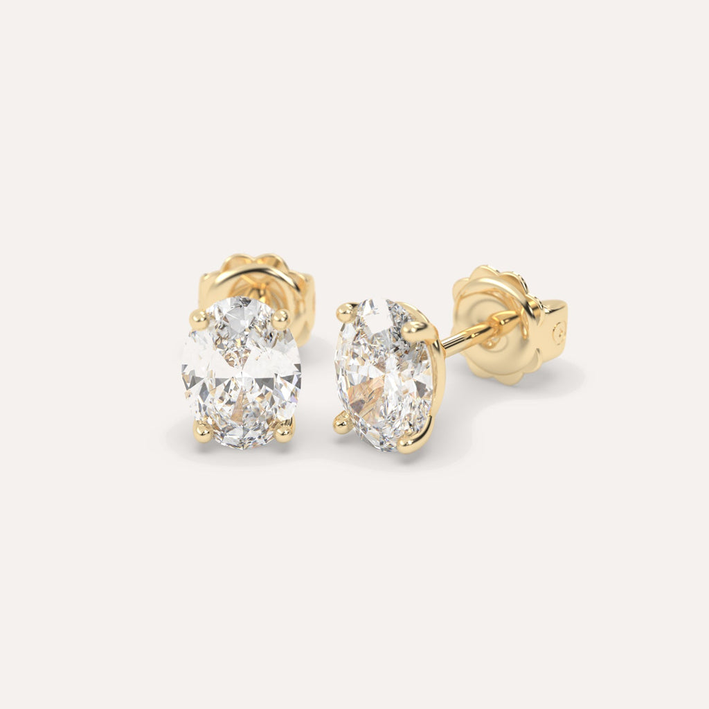 Oval Diamond Stud Earrings Pair Yellow Gold